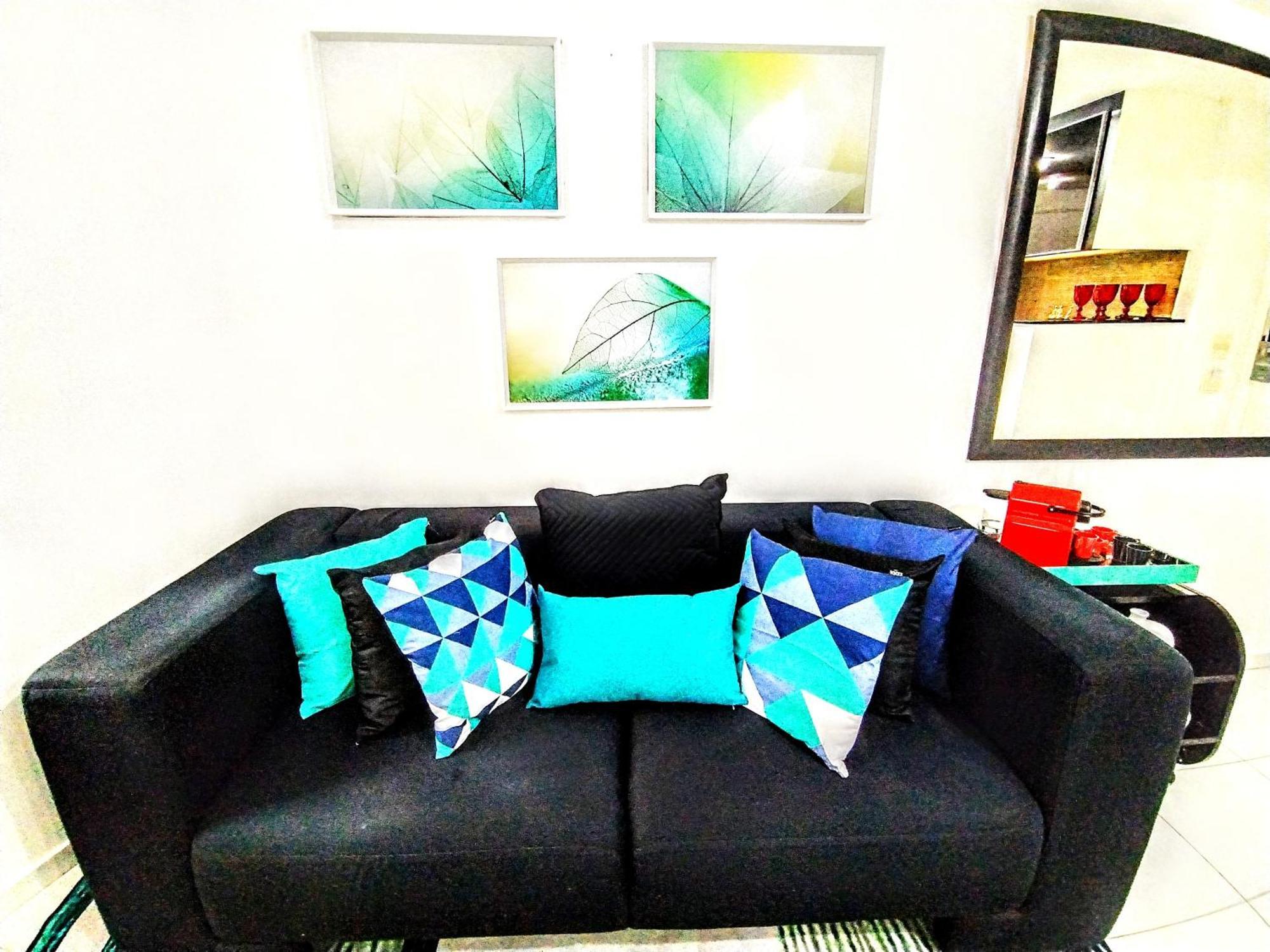 Radisson Vila Olimpia São Paulo Eksteriør billede A sofa with cushions