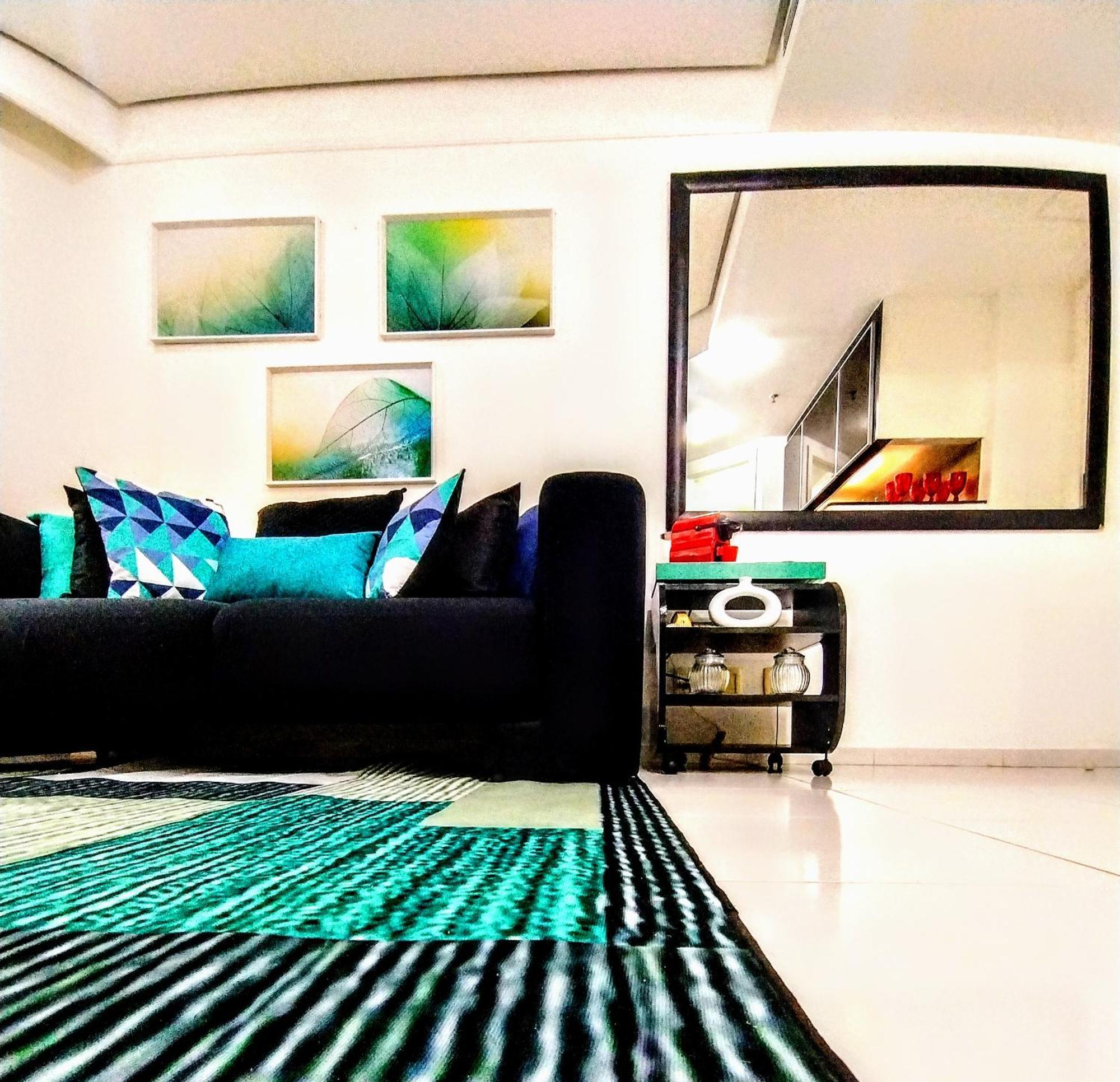 Radisson Vila Olimpia São Paulo Eksteriør billede A living room in a condominium